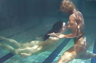 Babes, swim, strip and have fun underwater